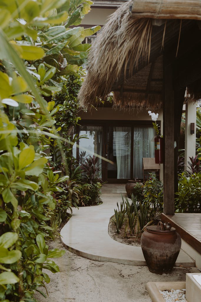 Empty Pathway Beside Green Plants